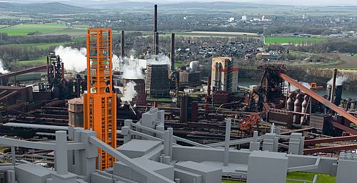 Animation der SALCOS-Direktreduktionsanlage. Im Hintergrund das Stahlwerk der Salzgitter AG.
